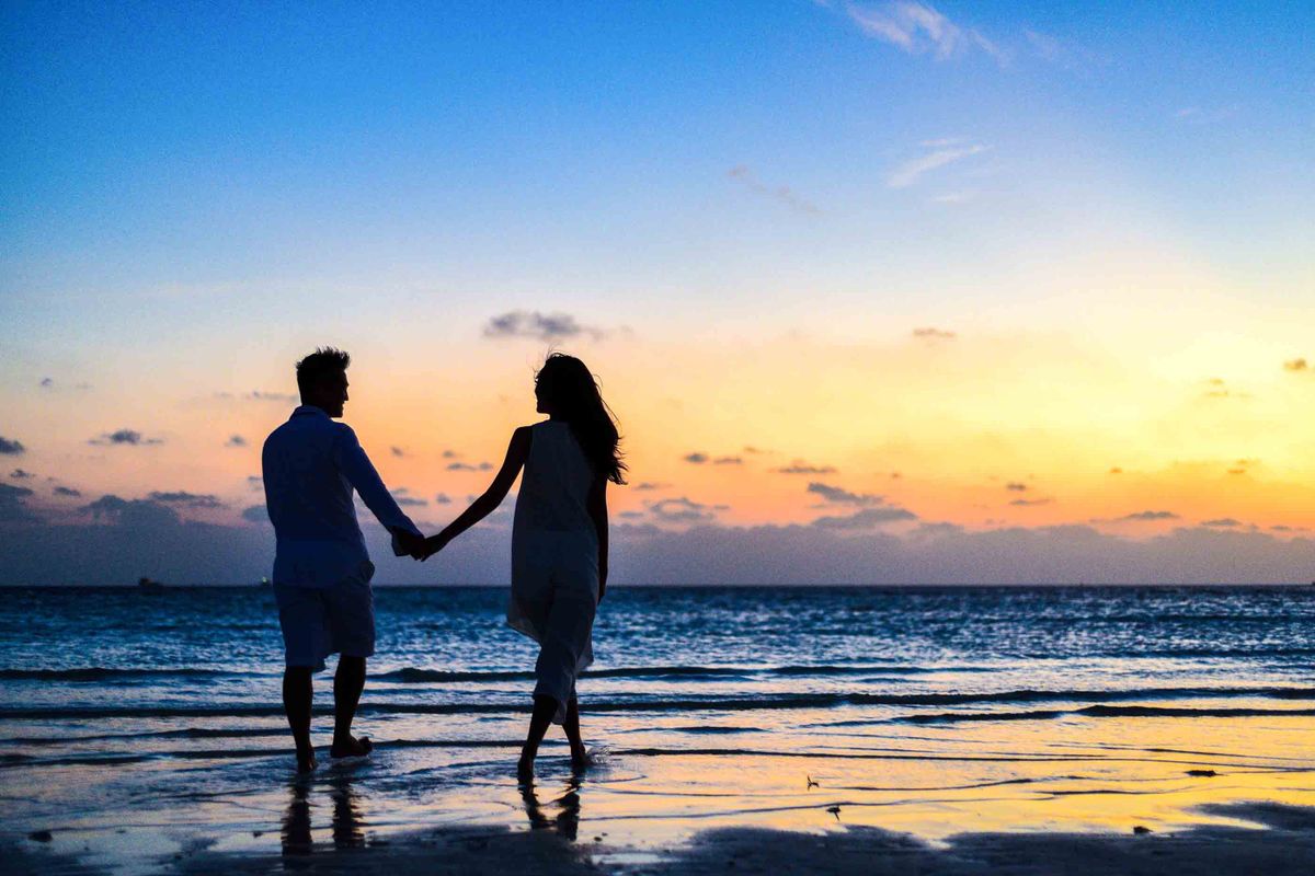 A couple celebrating a romantic milestone together outdoors